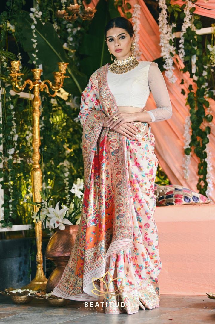 Stylish Cream Banarasi Silk Saree With Gleaming Blouse Piece
