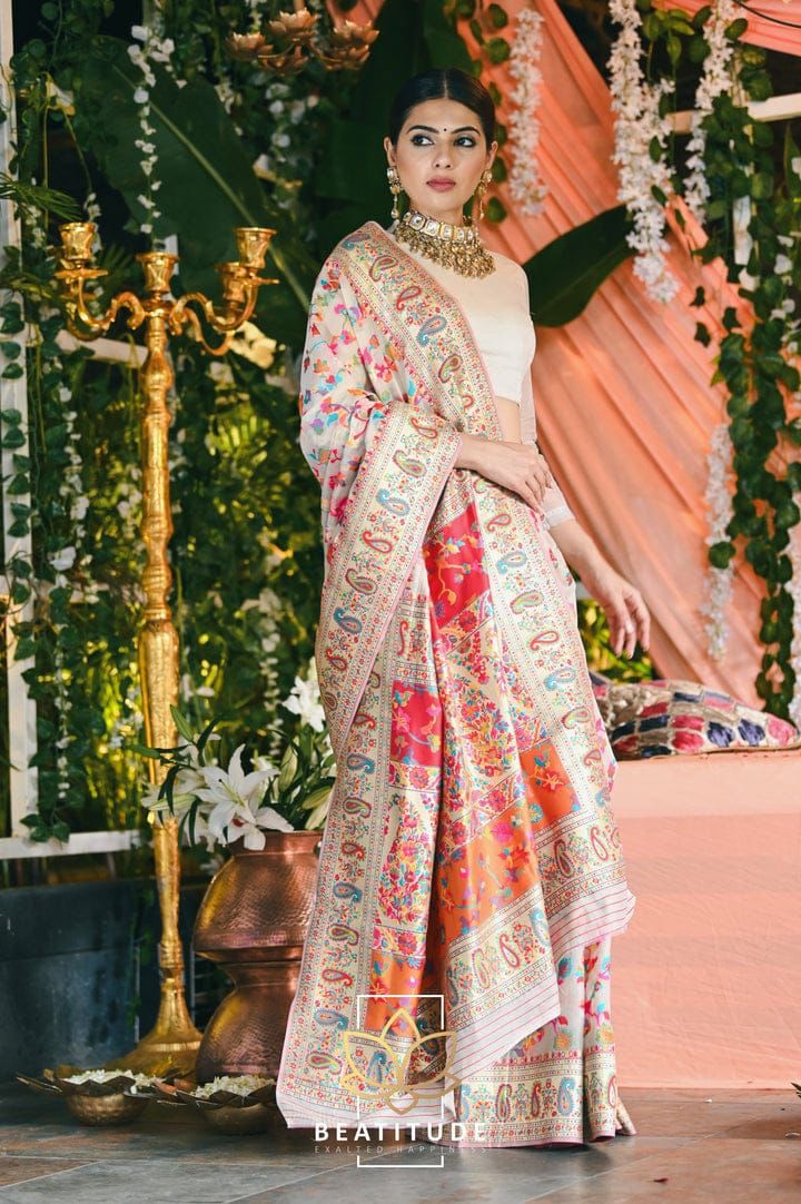Stylish Cream Banarasi Silk Saree With Gleaming Blouse Piece