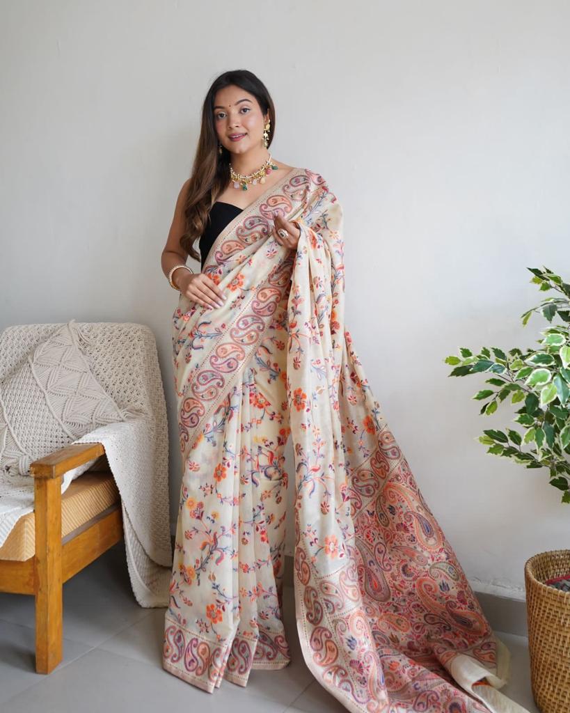 Stylish Cream Banarasi Silk Saree With Gleaming Blouse Piece