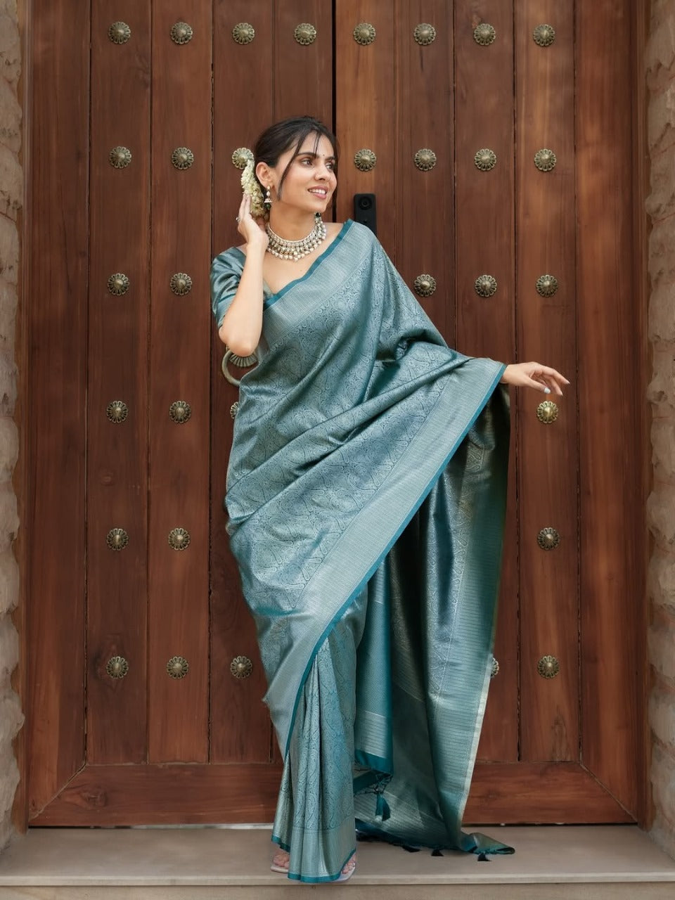 Prettiest Firozi Soft Silk Saree With Delectable Blouse Piece