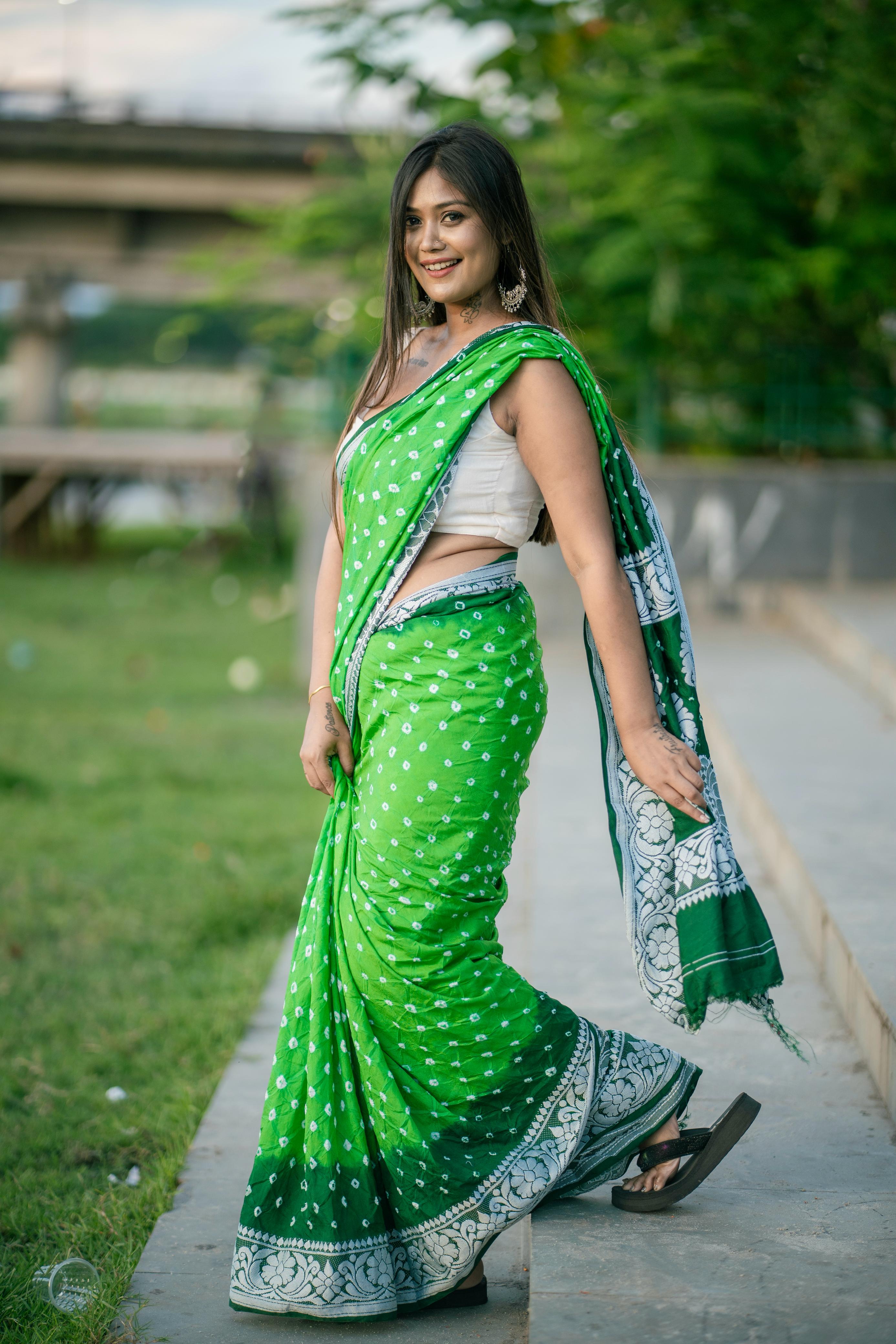 Desirable Parrot Dola Silk Saree With Prettiest Blouse Piece