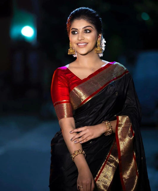 Impressive Black Soft Banarasi Silk Saree With Fairytale Blouse Piece